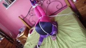 xsiteability.com - Daphne gagged with legs tied overhead thumbnail
